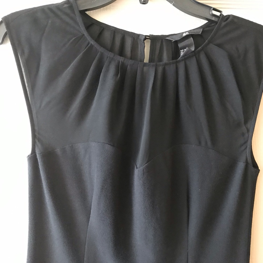 Black cocktail dress, sheer top, sweetheart neck